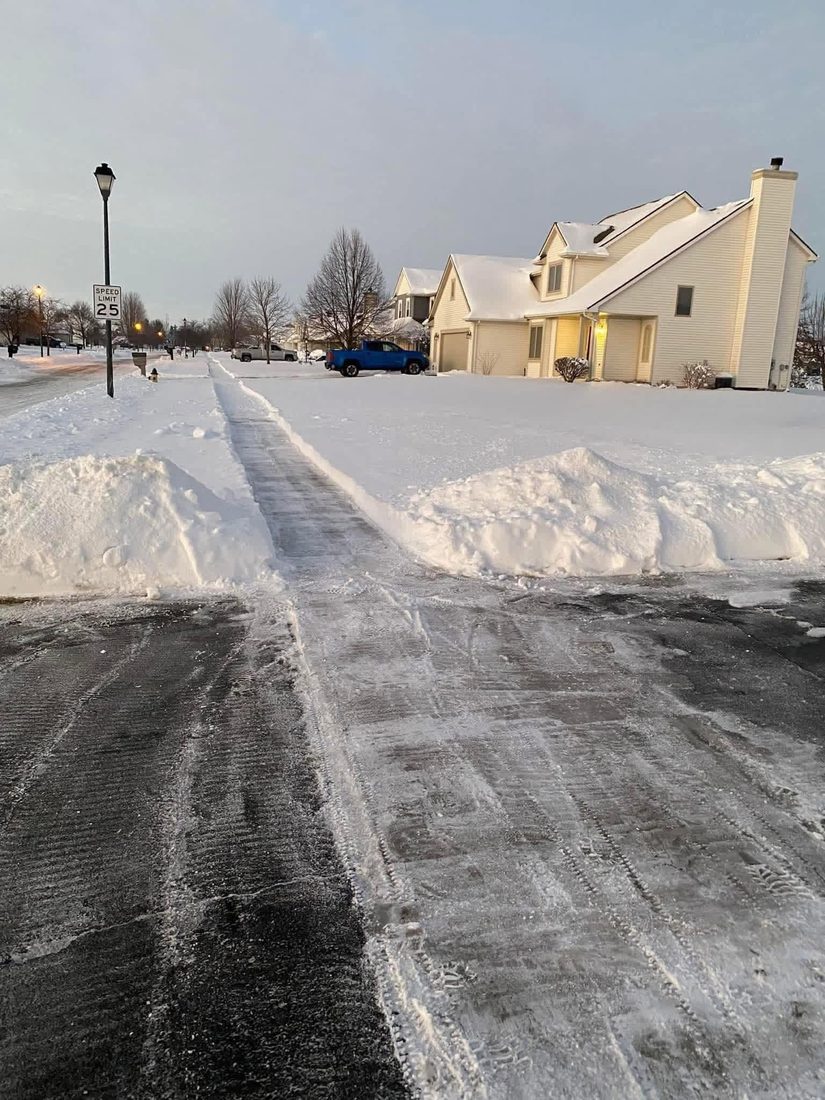 Cleared driveway and street after a snowfall